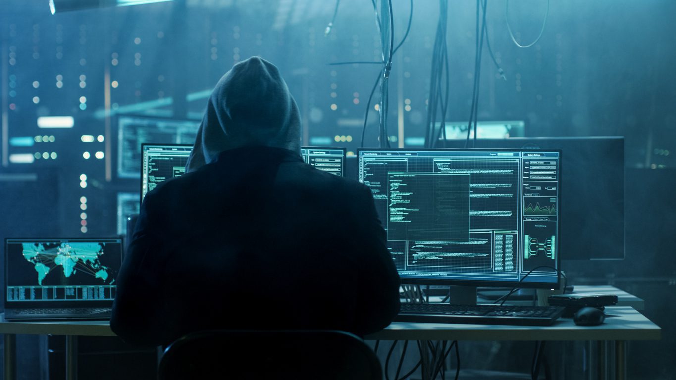 Hacker working during a cybersecurity war.
